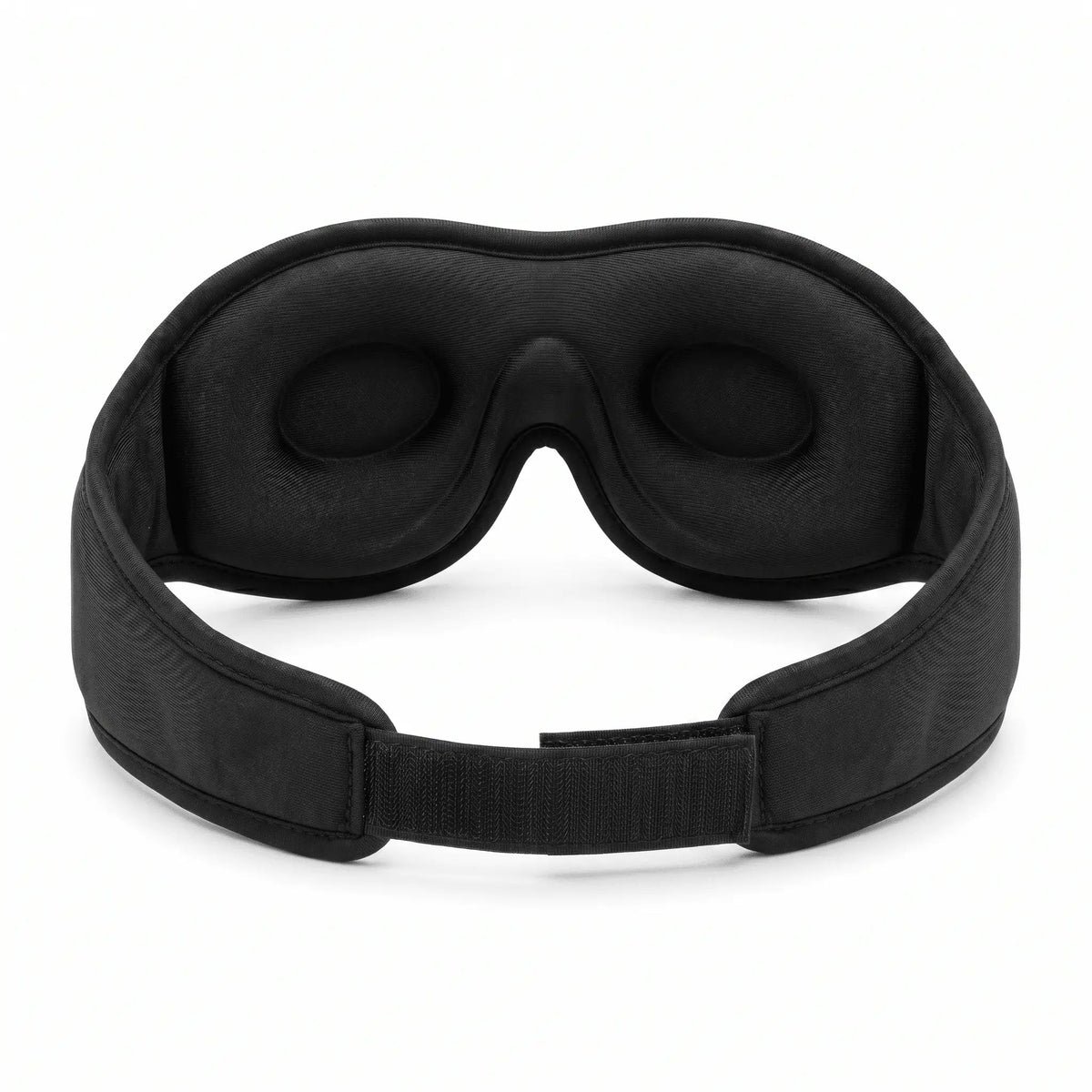 Inside view of the Nurtura 3D sleep mask showing deep cushioned eye cups and an adjustable strap.